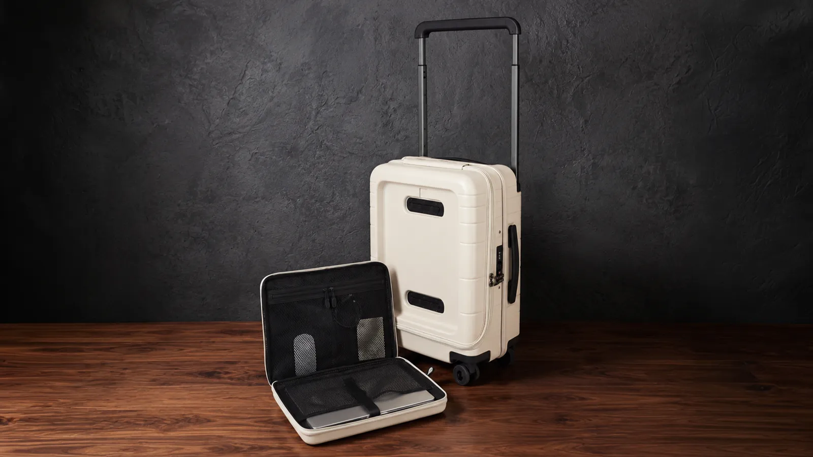 The Vasy front pocket opened flat, showing the padded laptop sleeve and document organiser.